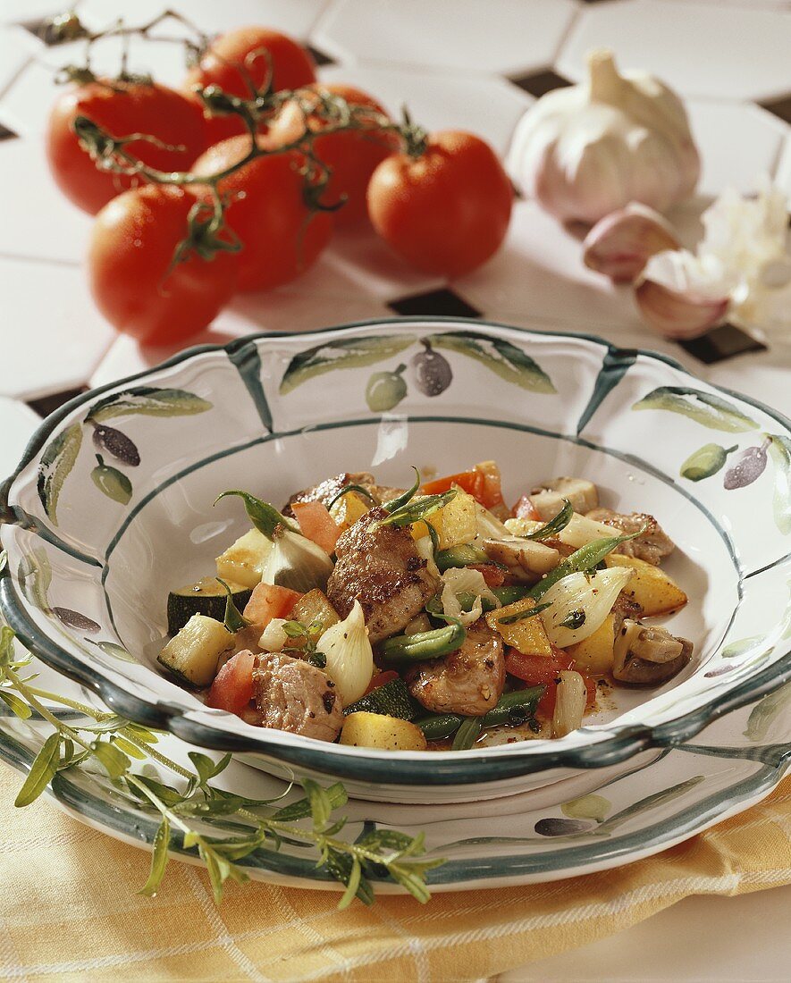 Lamb stew with potatoes, garlic, green beans, tomatoes