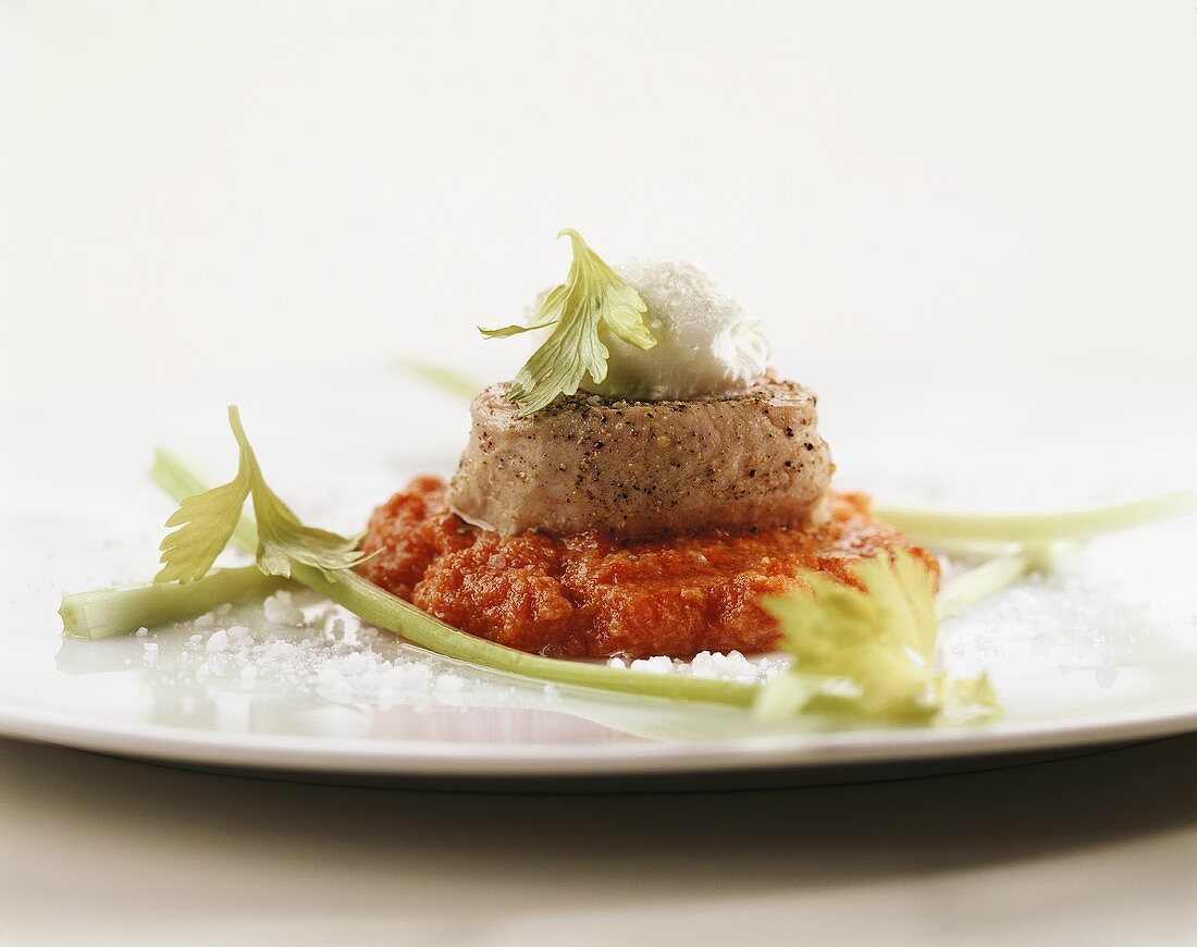 Steamed veal fillet on tomato relish