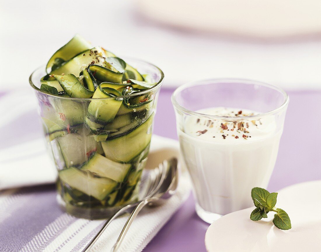 Courgette salad in glass and yoghurt dressing
