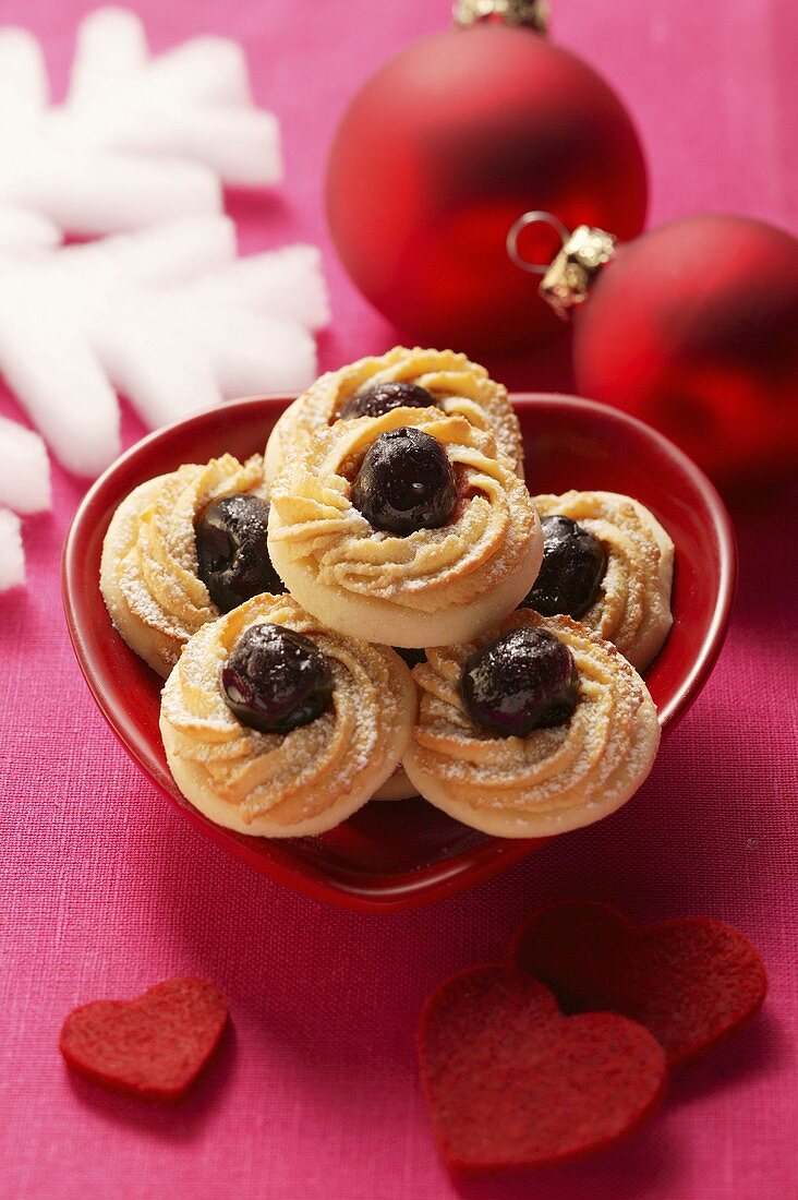 Christmassy piped biscuits with cherries
