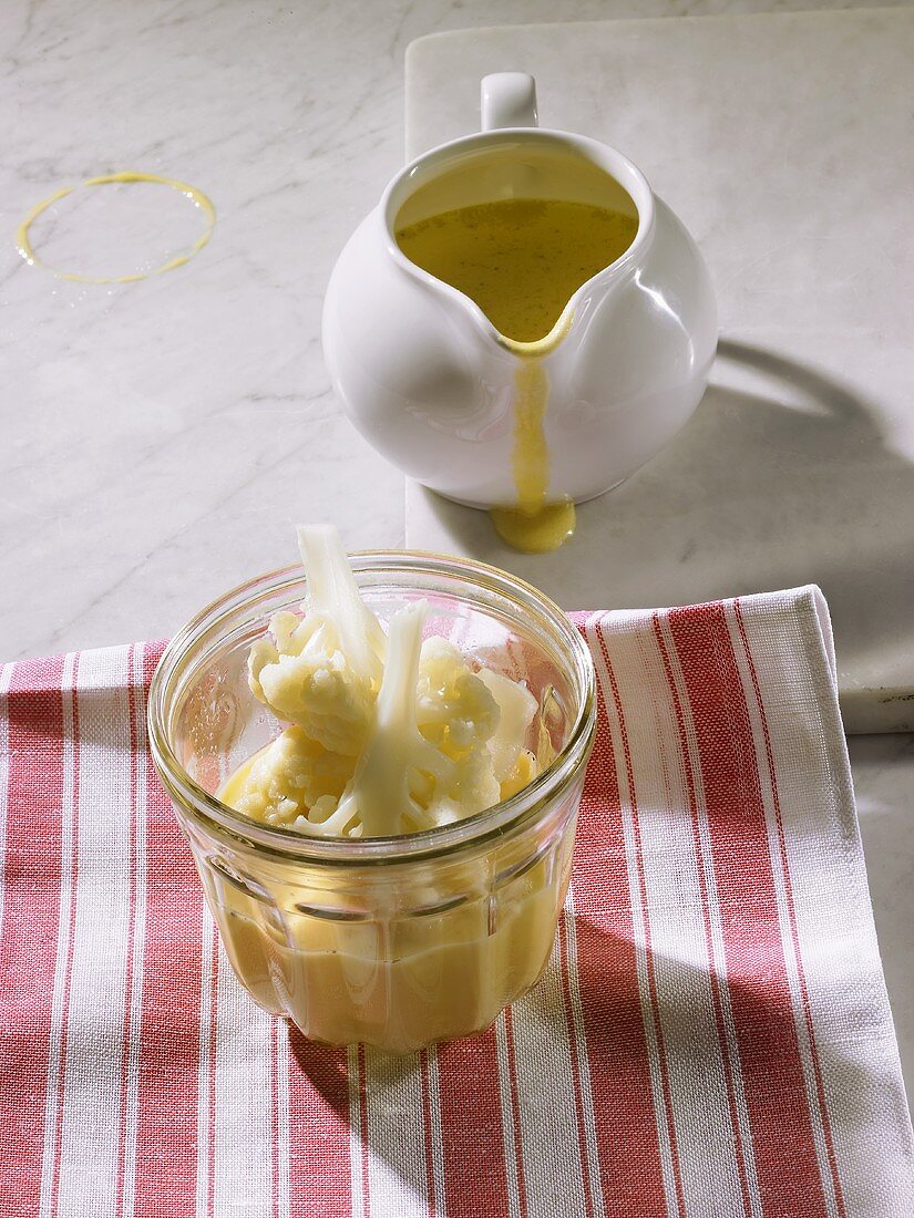 Cauliflower in cheese sauce in glass