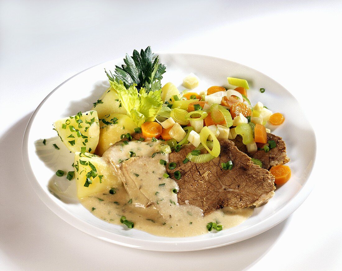 Boiled beef fillet with vegetables and parsley potatoes