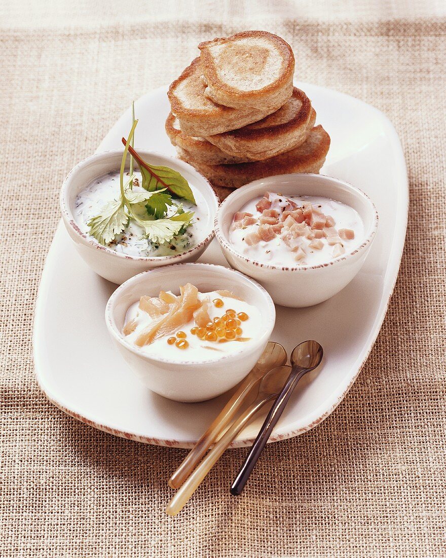 Blinis with caviare and yoghurt dips