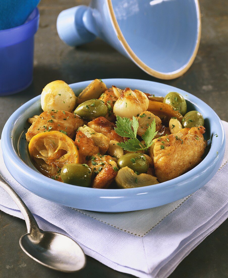 Chicken tajine with olives, artichokes and onions