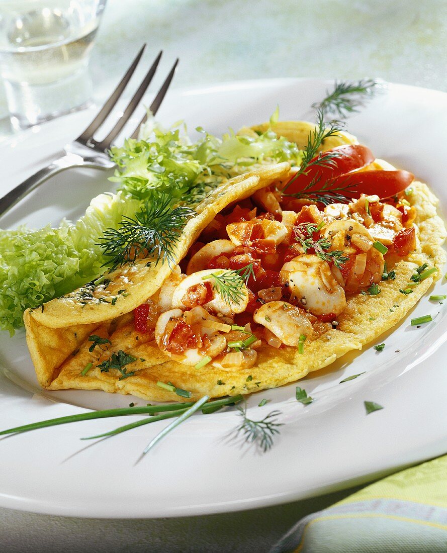 Herb omelette with mushrooms and tomatoes