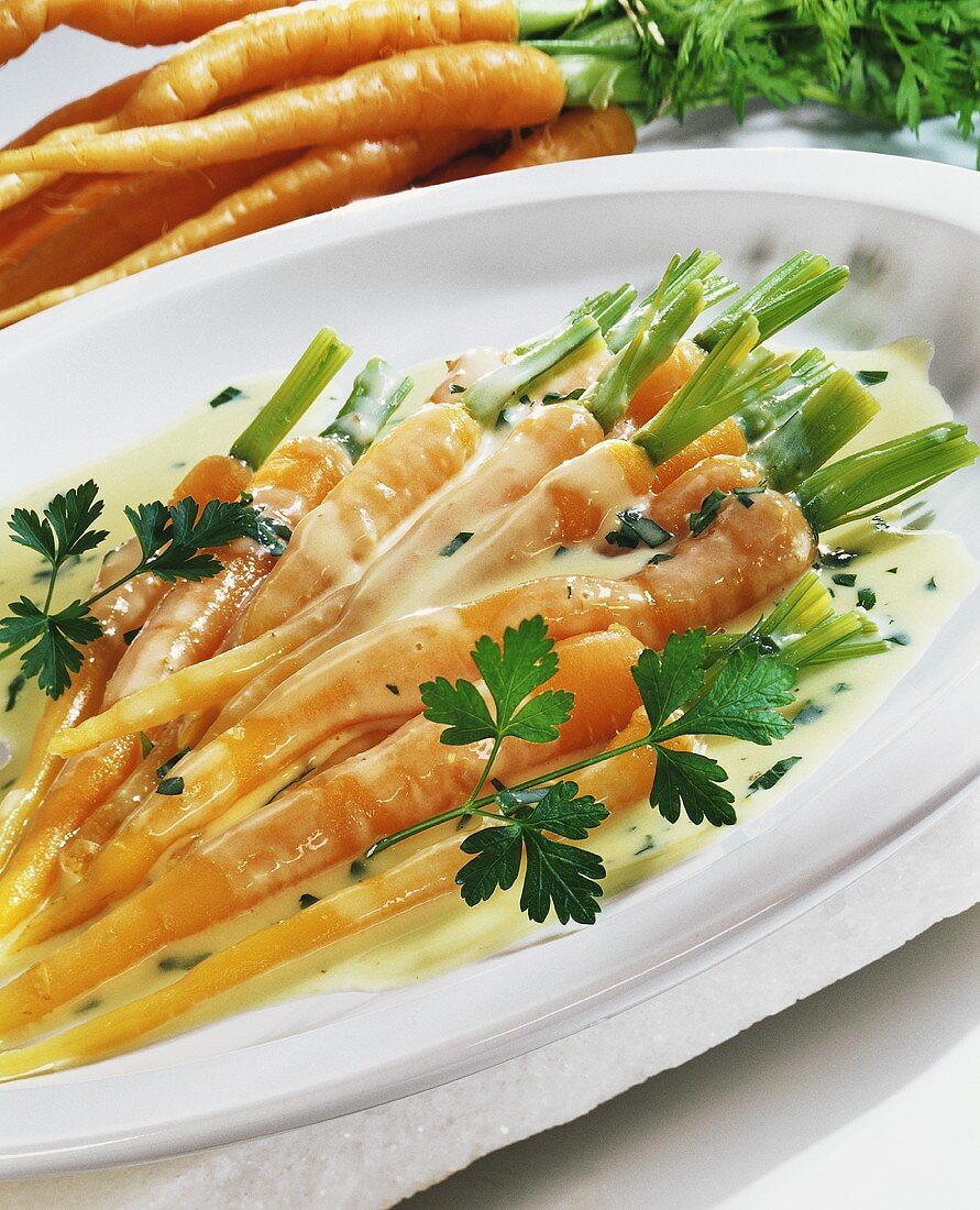 Carrots with white sauce and parsley