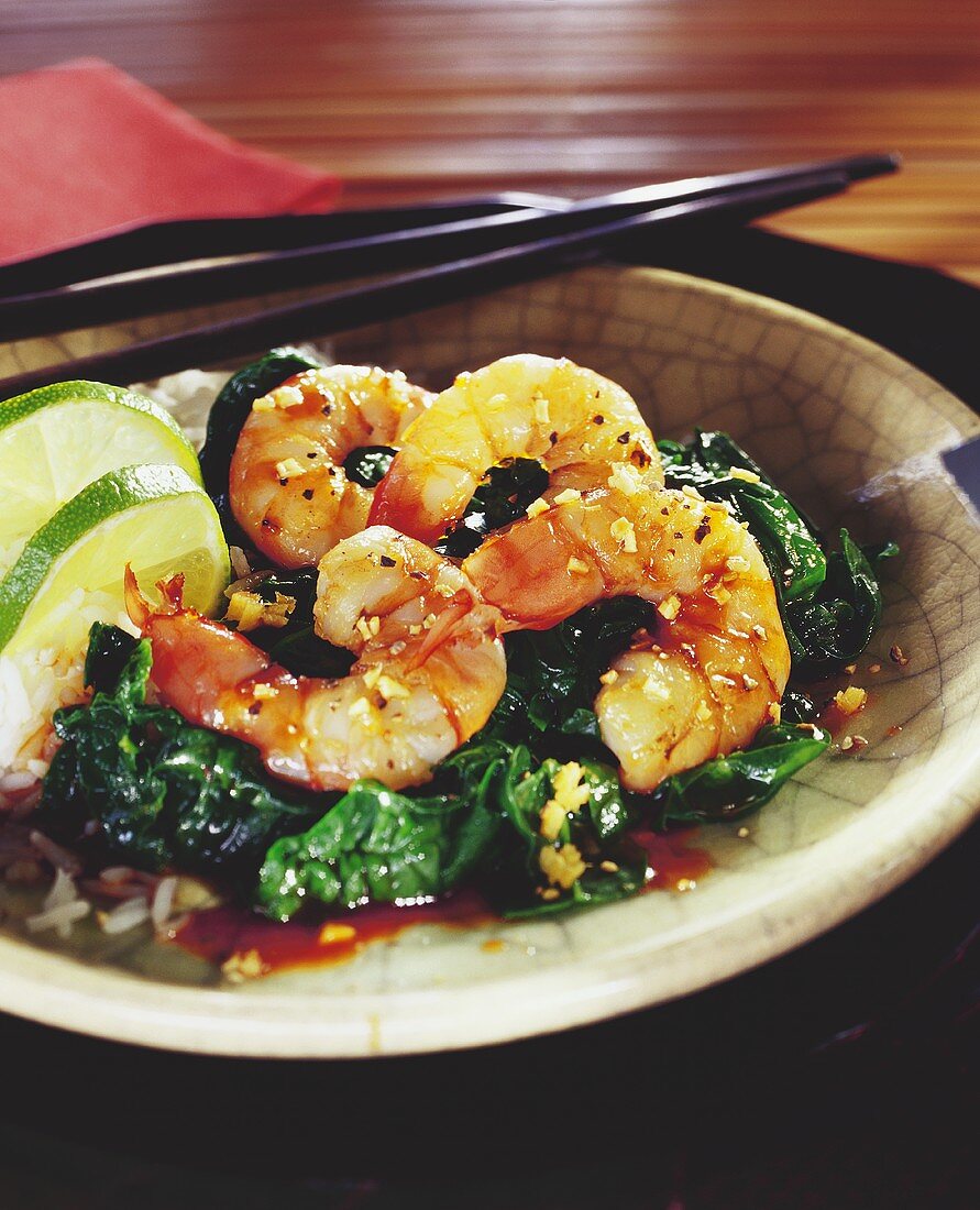 Fried king prawns with spinach