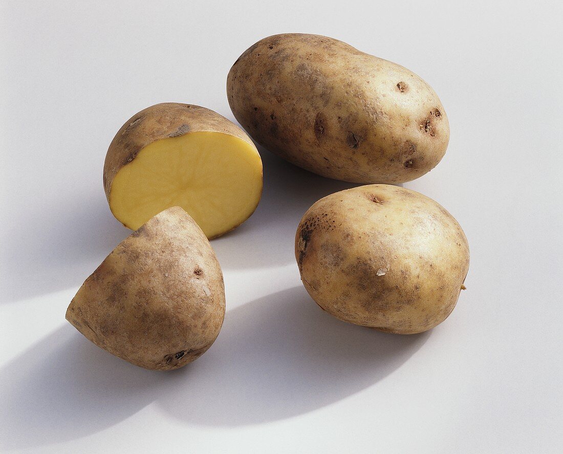 Three potatoes, one halved