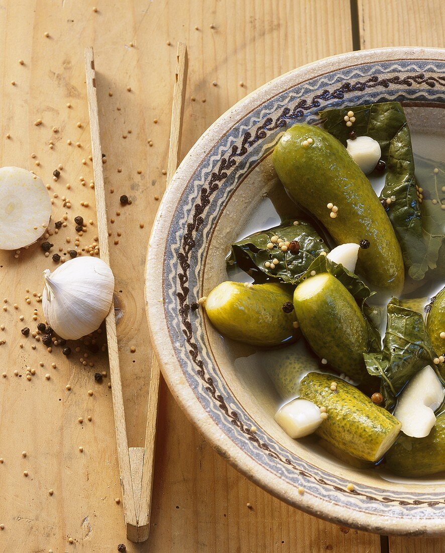 Pickled cucumbers in white wine with garlic and spices