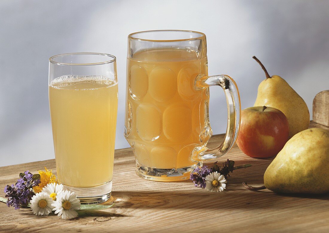 Apple and pear must in jug and glass (diluted)