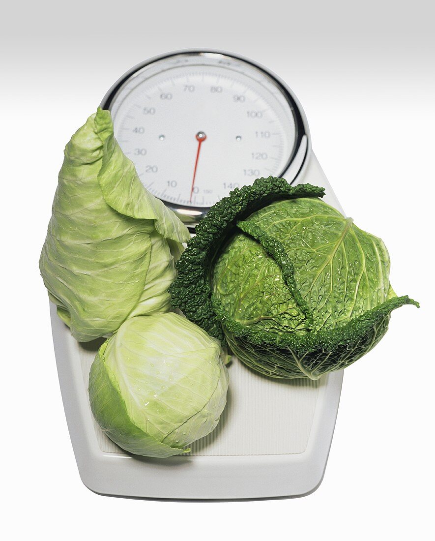Three cabbages on scales