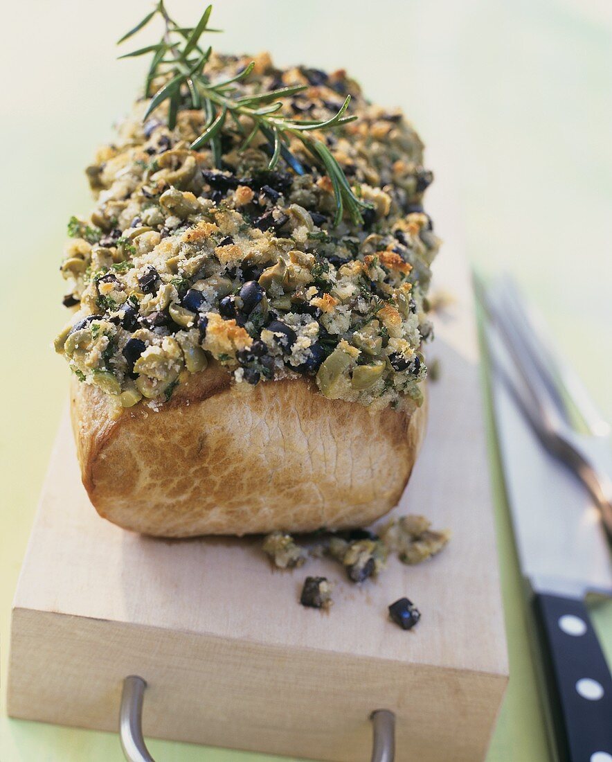 Loin of pork with olive and herb crust