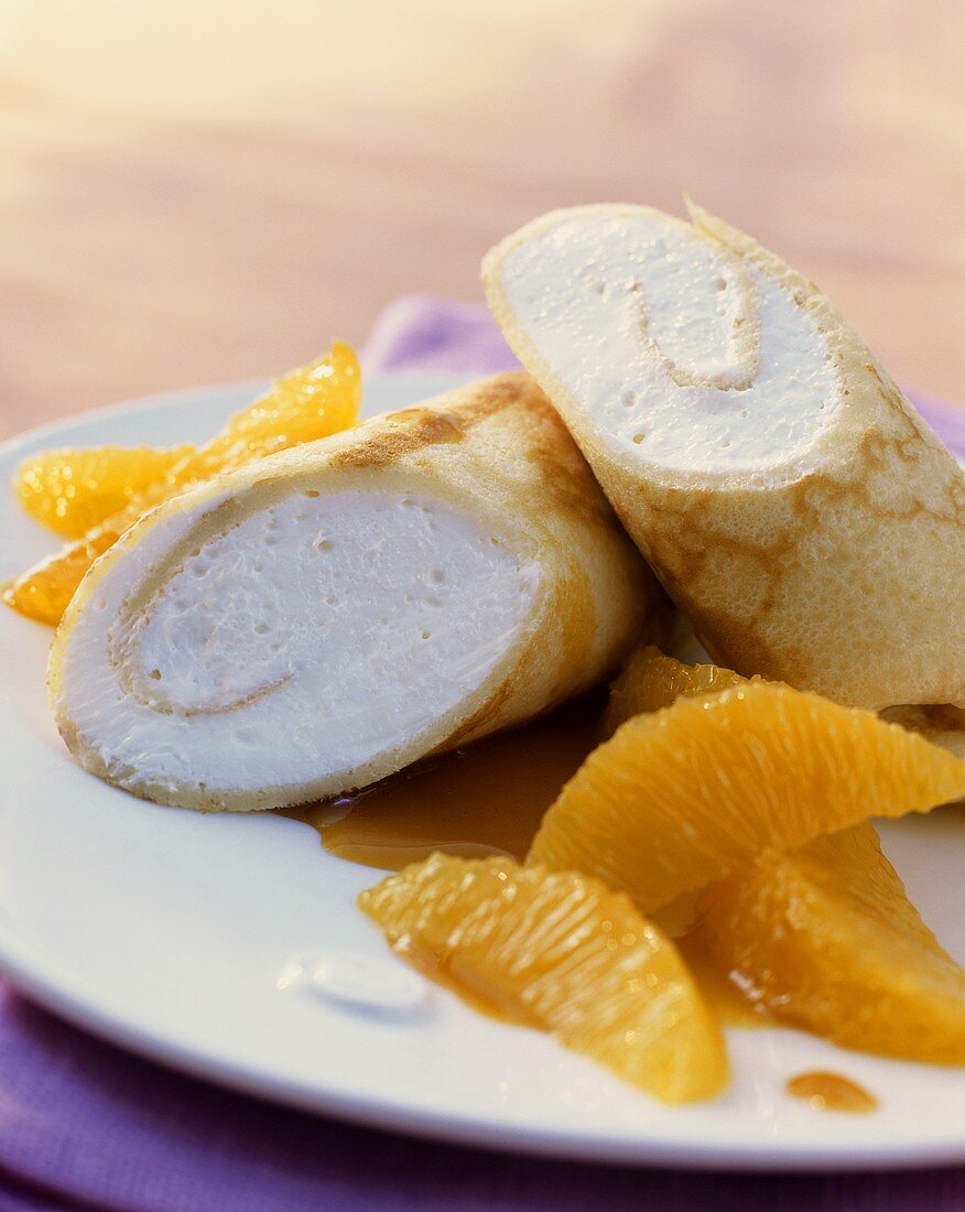 Crepes filled with Grand Marnier whip with orange segments