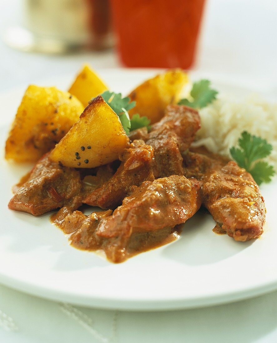 Lamb stew with potatoes, coriander and rice (India)