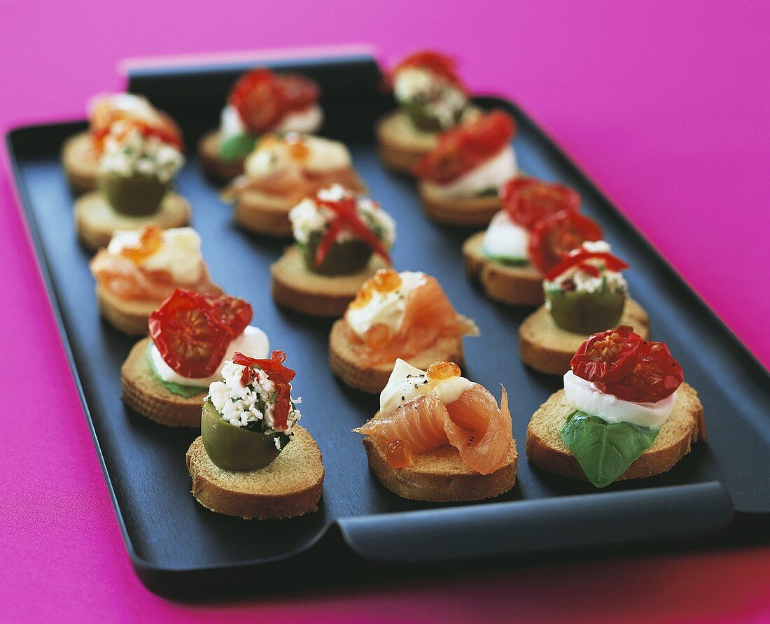 Assorted crostini on tray