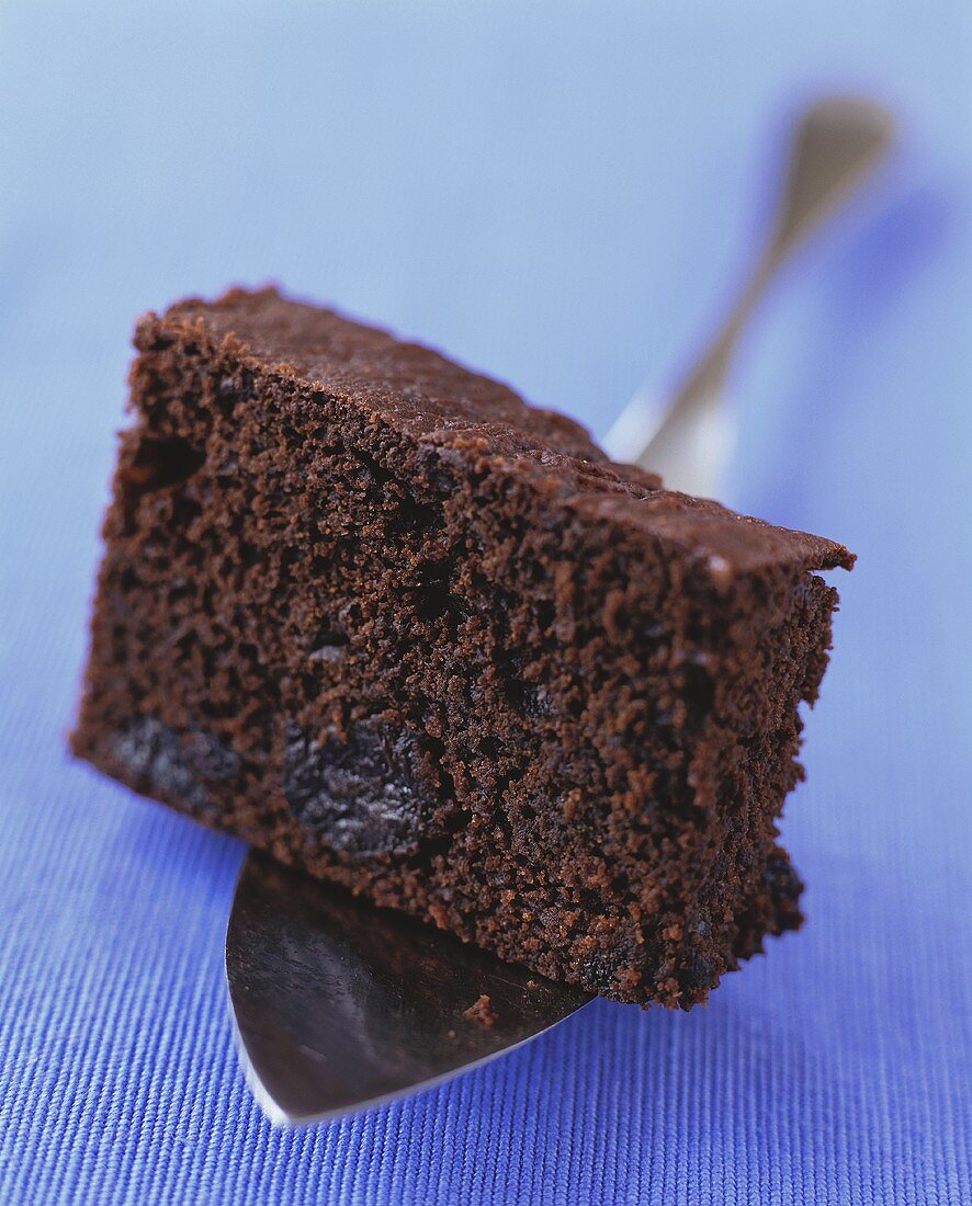 Piece of chocolate cake with prunes