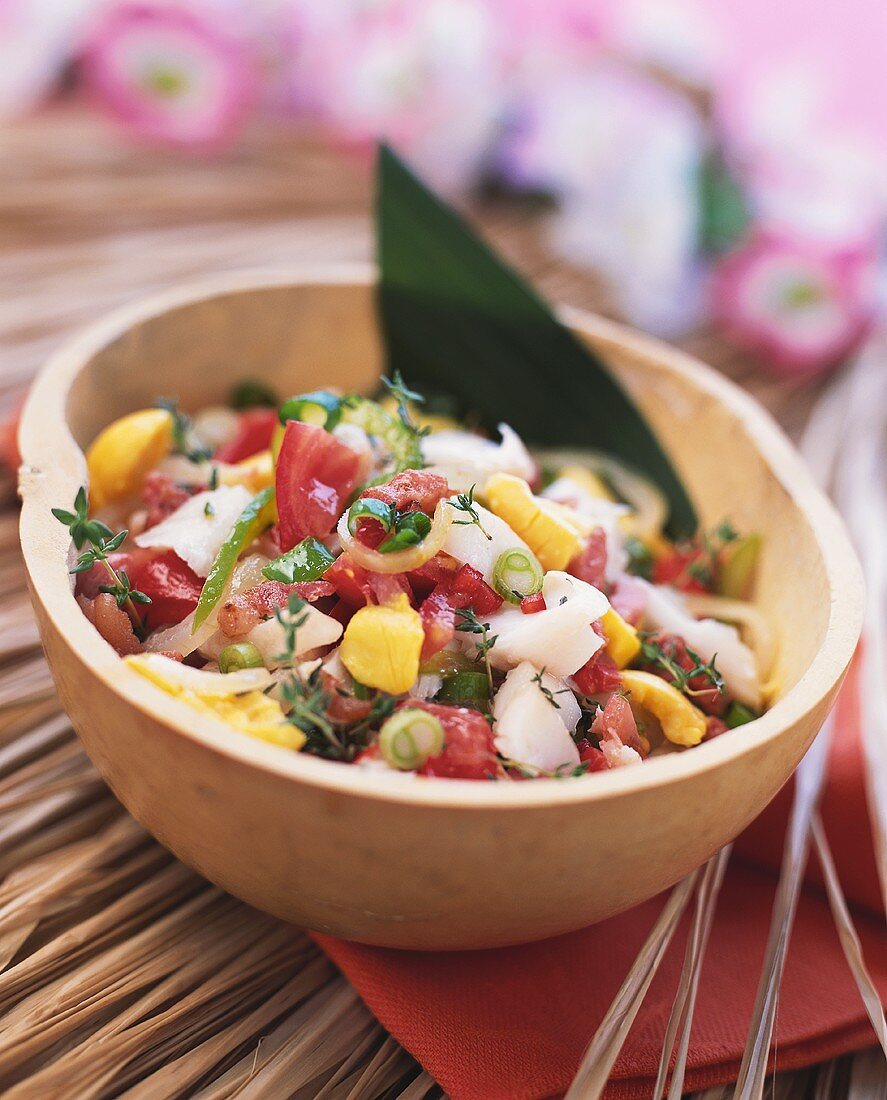 Fruity vegetable salad with fish and mango (Caribbean)