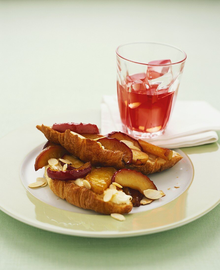 Croissants with nectarines and flaked almonds