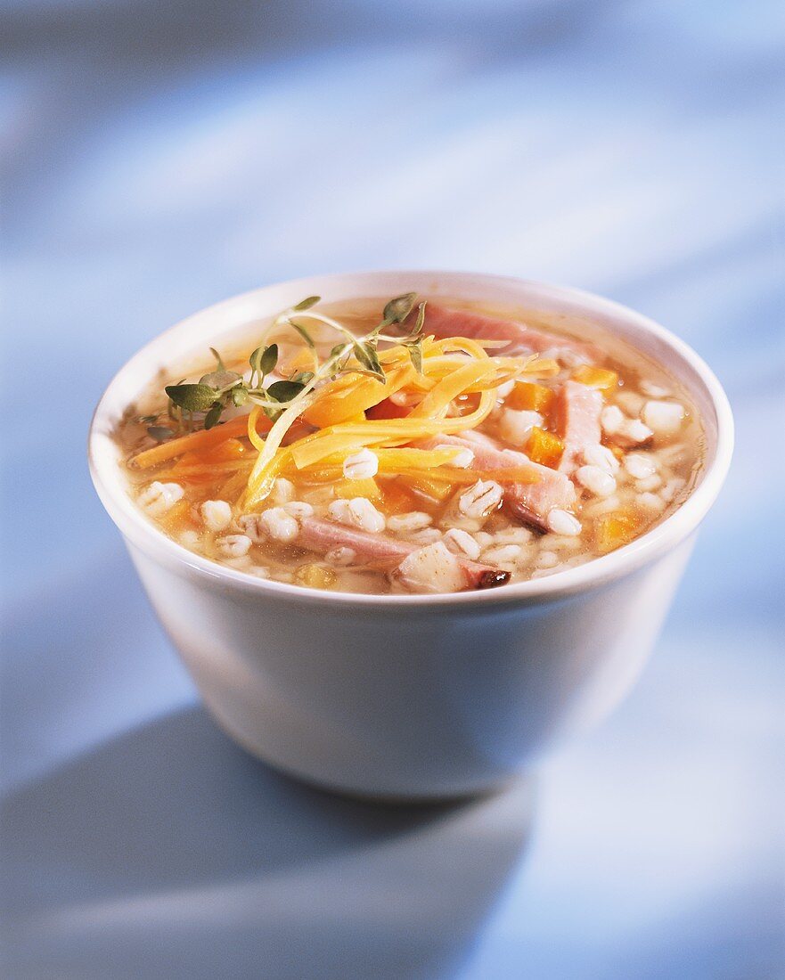 Barley soup with carrots and ham