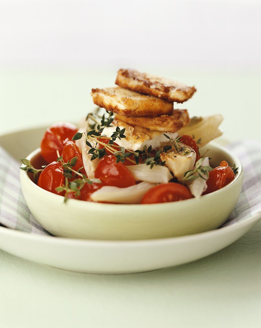 Fennel and tomatoes with fried sheep's cheese