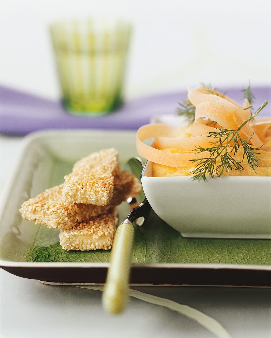 Tofu slices in sesame panade with carrot puree