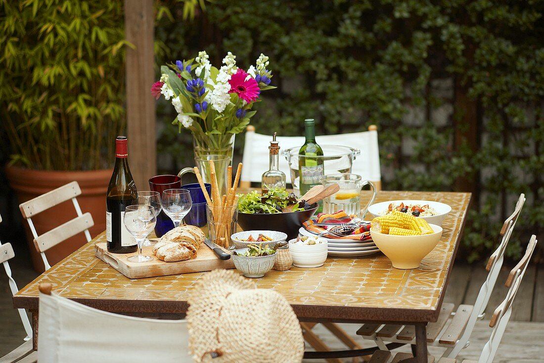 Table laid in open air for a barbecue