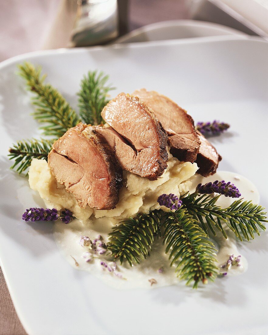 Pheasant breast on parsnip puree with fir branches