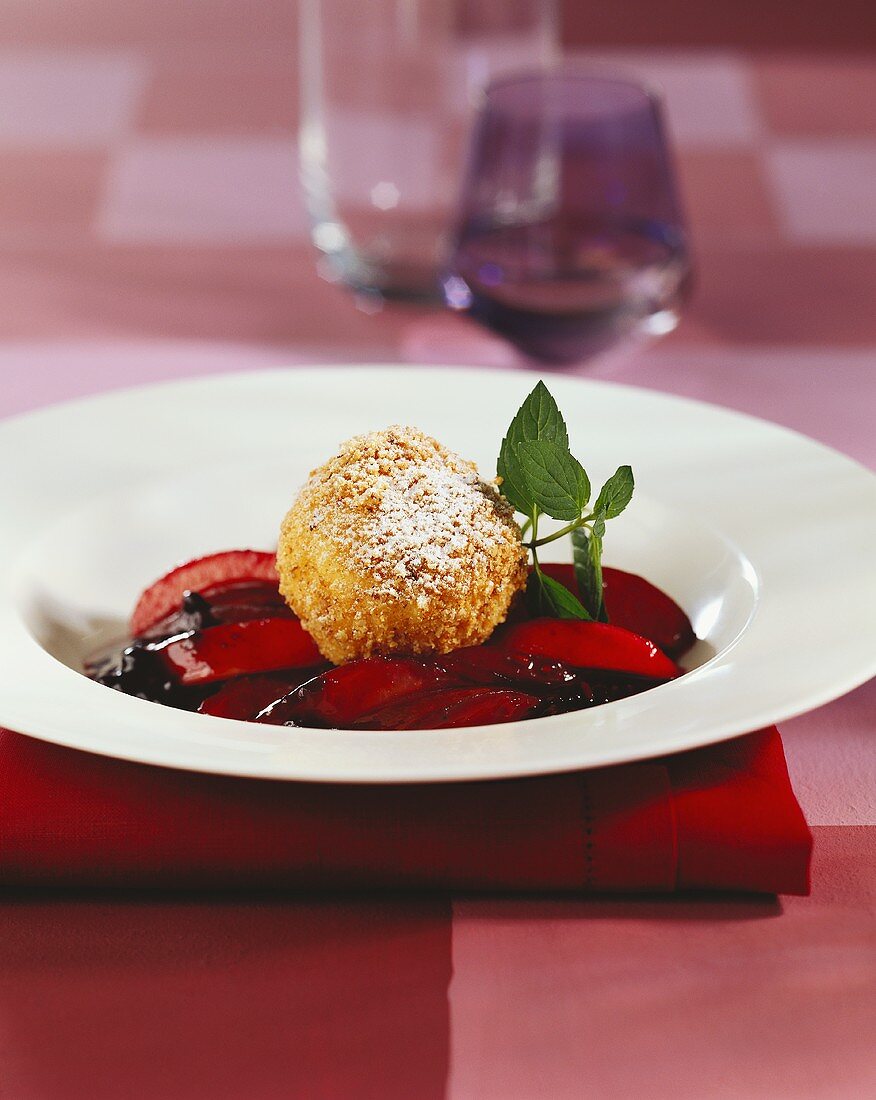 Cottage cheese dumplings with elderberry and ginger compote