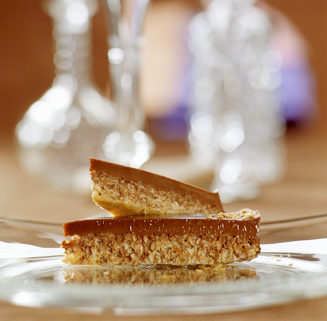 Two pieces of chocolate coconut tart