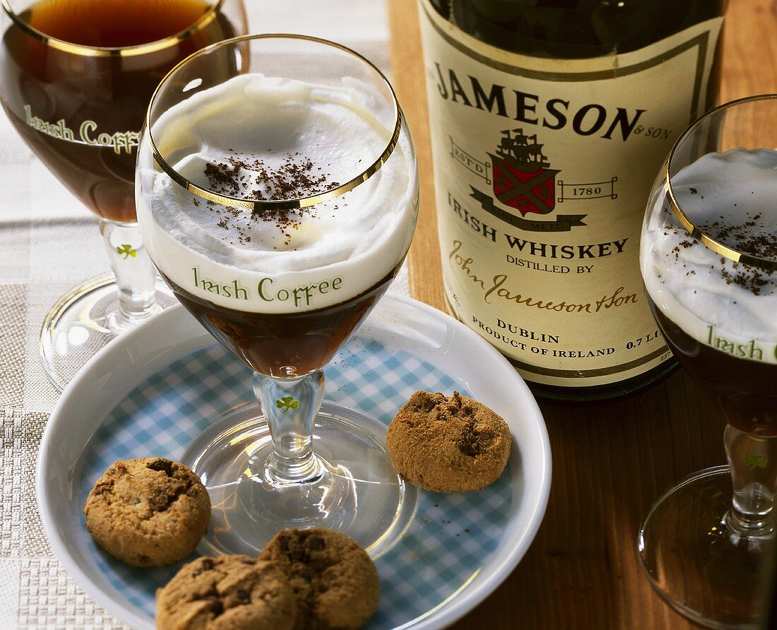 Irish Coffee with whiskey and cream in a glass