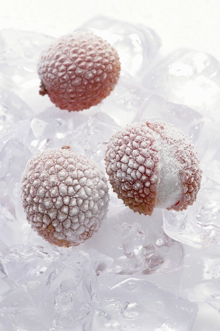 Frozen lychees on ice cubes