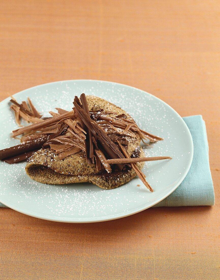 Chocolate omelette with icing sugar