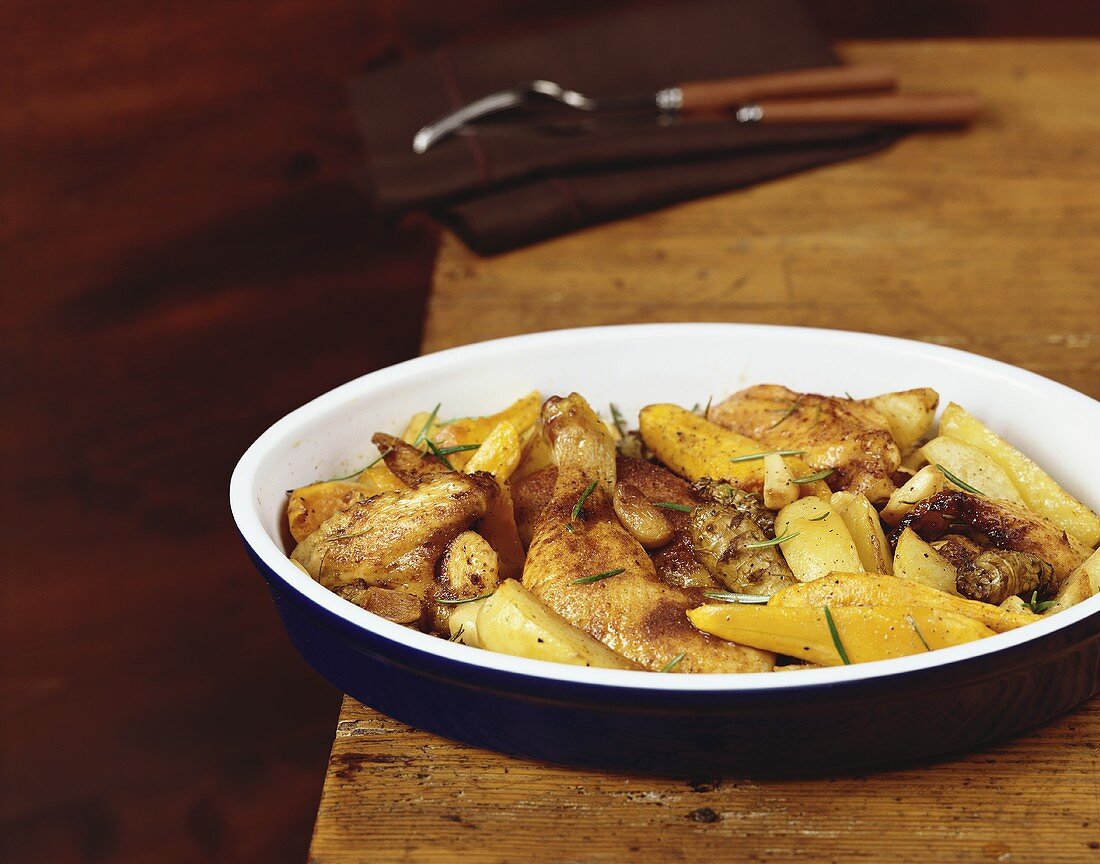 Hähnchen mit gebratenem Kürbis und Kartoffeln