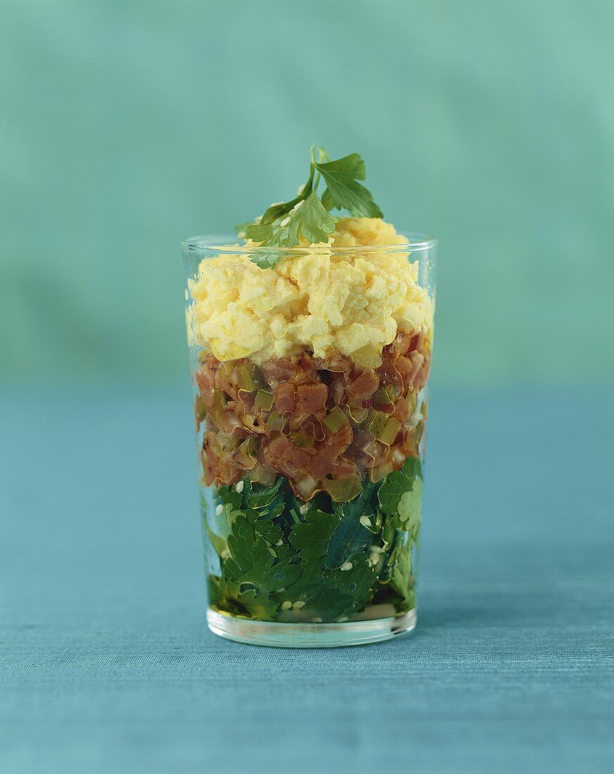Beef tartare with parsley salad & truffled egg in a glass