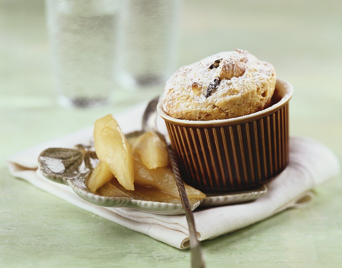 'Log pyre' (bread and butter pudding) with glazed pears