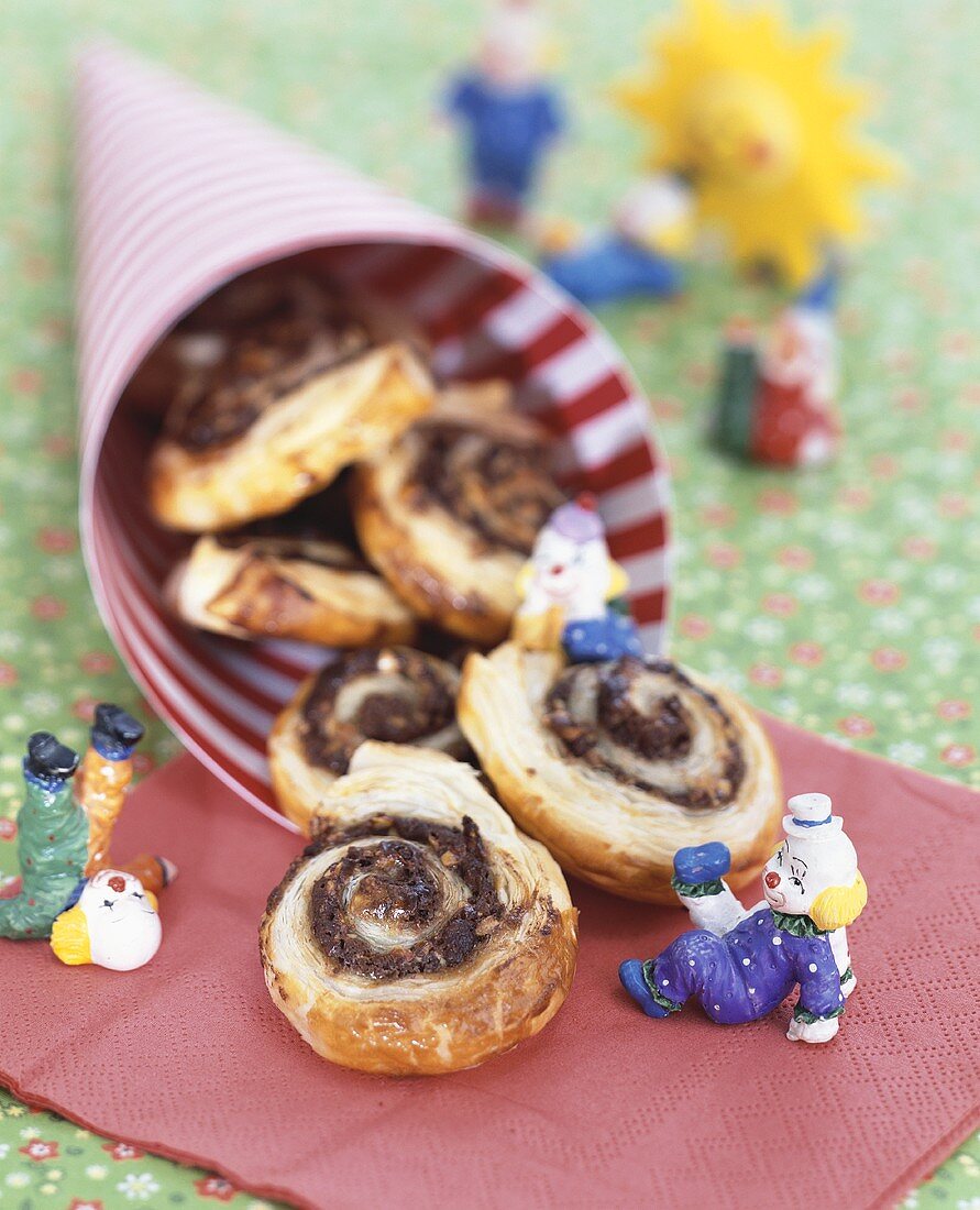 Nut buns for children on napkin and in paper cone