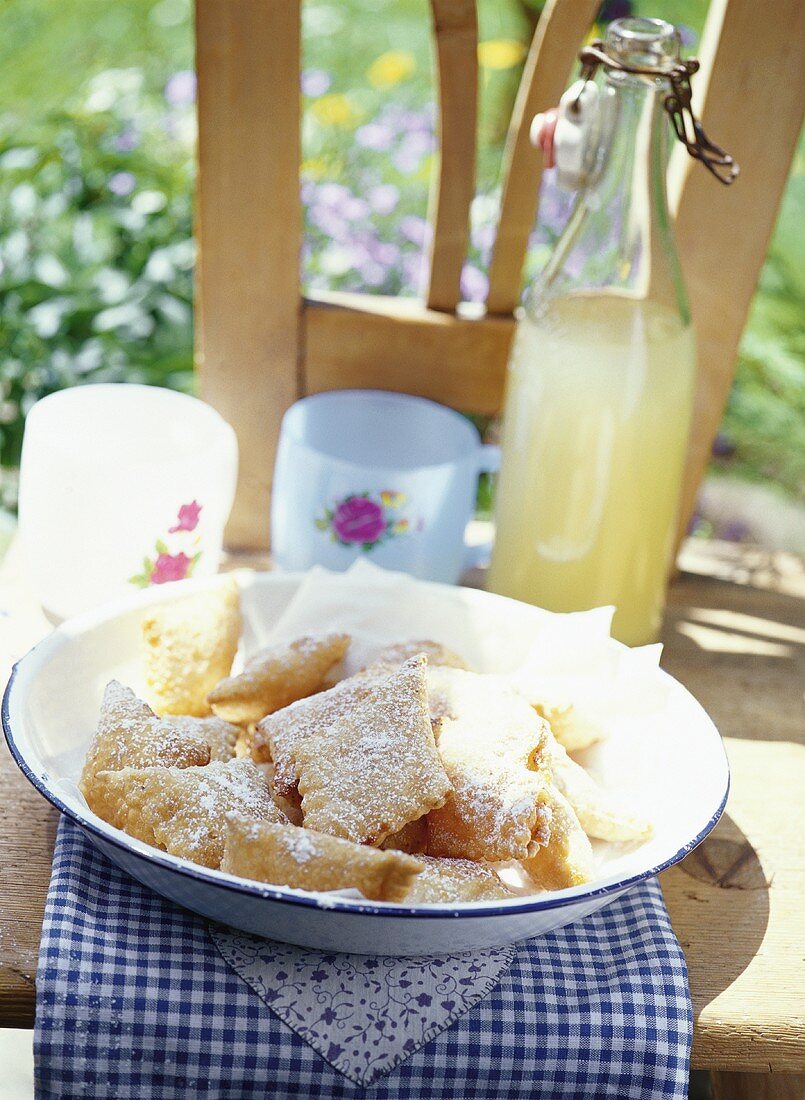 Fried pastries with apricot filling & icing sugar (S. Tyrol)