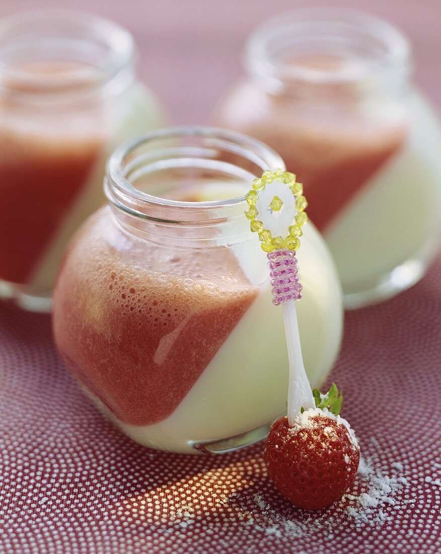 Lemon milk jelly with cold strawberry and coconut soup