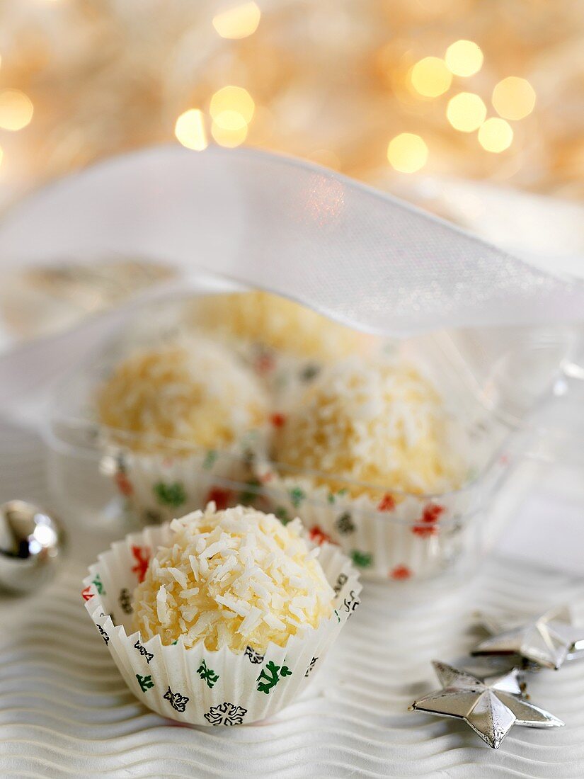 White chocolate truffles with grated coconut for Christmas