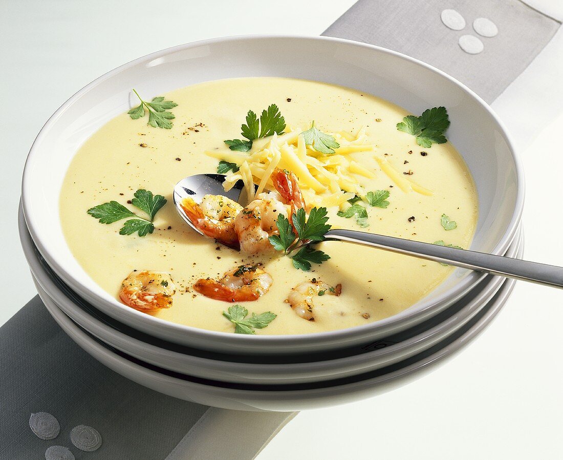 Cheese cream soup with fried shrimps