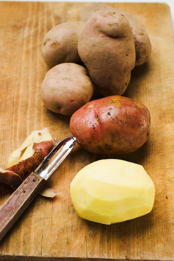 Red potatoes, one peeled