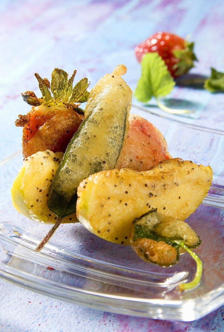 Fruit tempura on glass plate