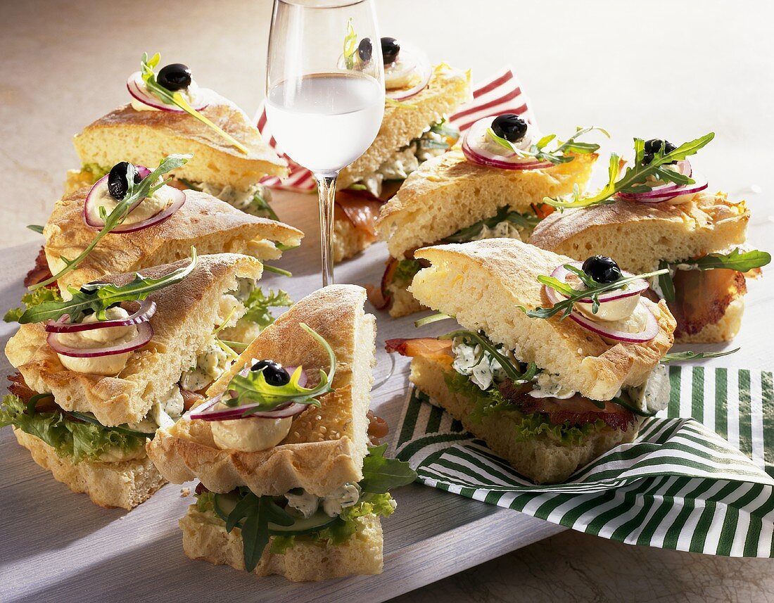 Savoury sandwich cake with salmon, soft cheese & rocket filling