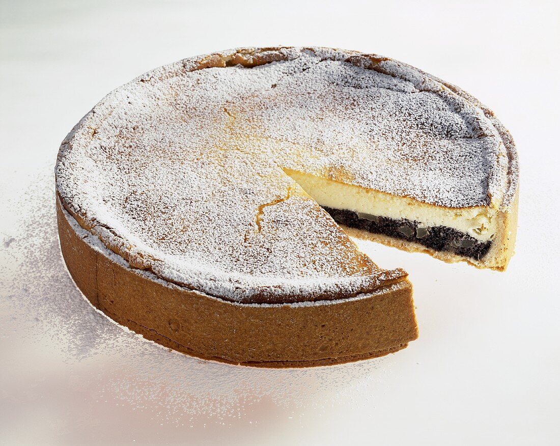 Pear and poppy seed cheesecake, a slice taken