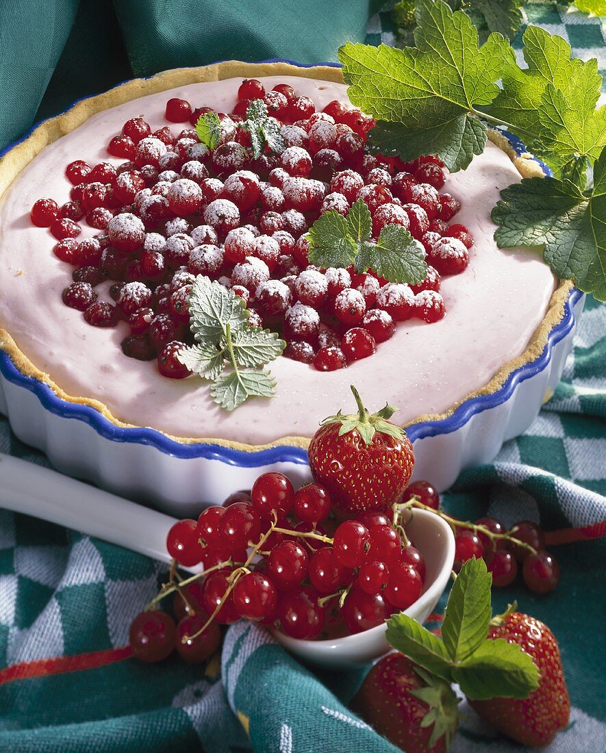 Strawberry and redcurrant tart with quark cream