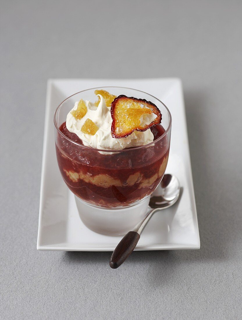 Plum trifle with whipped cream