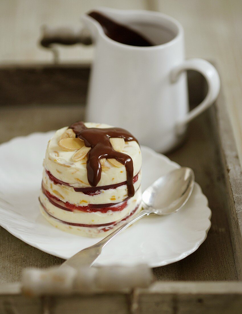 Nectarine meringue with chocolate sauce