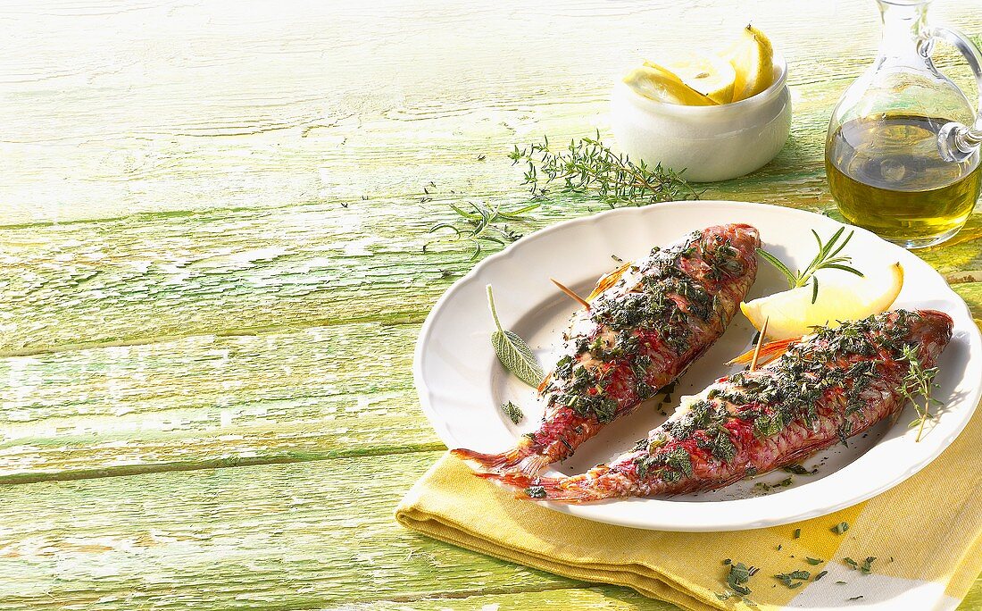Grilled red mullet with herbs, olive oil and lemons