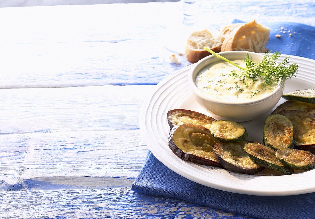 Deep-fried aubergines and courgettes with dip (Greece)