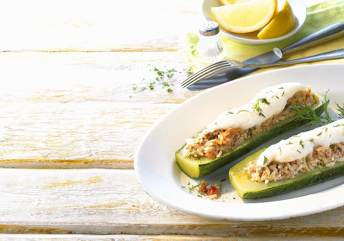 Stuffed courgettes with yoghurt sauce